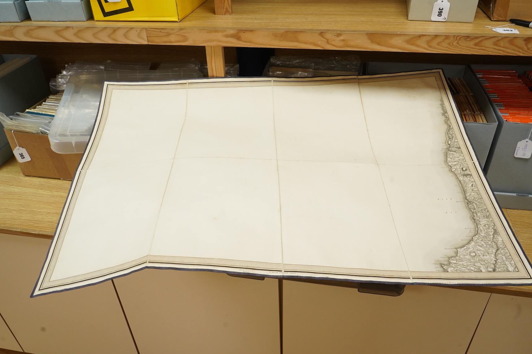 Ordnance Survey maps of Cornwall and part of Lundy, comprising of a set of six engraved maps mounted on linen and edged with blue cotton, including sheet no.s; 28, 29, 30, 31, 32 and 33, engraved by Benjamin Baker at the